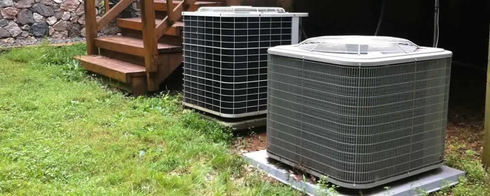 Heat pump installation and service units outside a home in Green Bay, WI